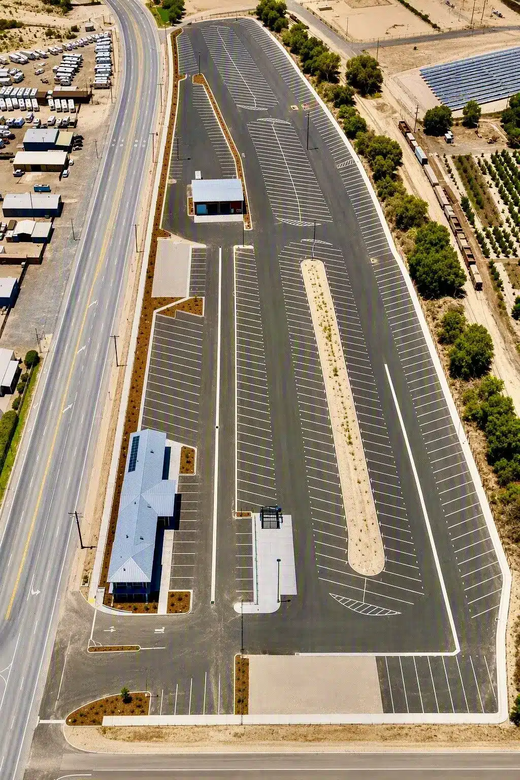 Overhead view of all 373 paved RV storage spaces at Highway 126 RV Storage beside Highway 126 in Fillmore, CA